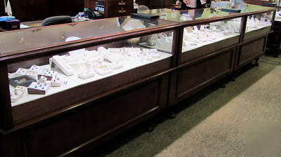 Set of 9 jewelry display showcases, glass and mahogany