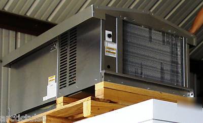 Self contained refrigeration condensing unit indoors