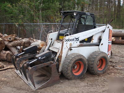 943 bobcat skidsteer many attachments *price reduced* 