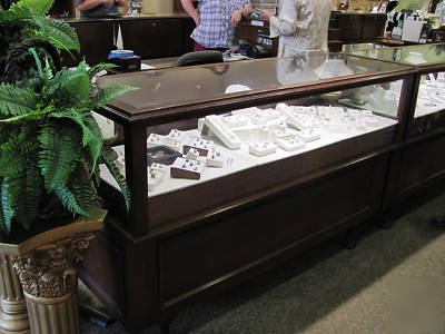 Set of 9 jewelry display showcases, glass and mahogany