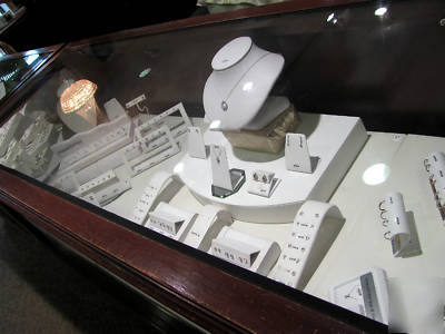 Set of 9 jewelry display showcases, glass and mahogany