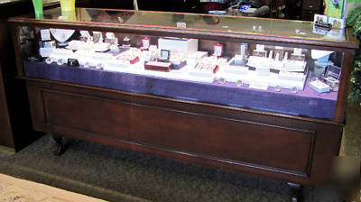 Set of 9 jewelry display showcases, glass and mahogany