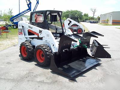 New bobcat S150 loader, 2005,w/ brand grapple & forks