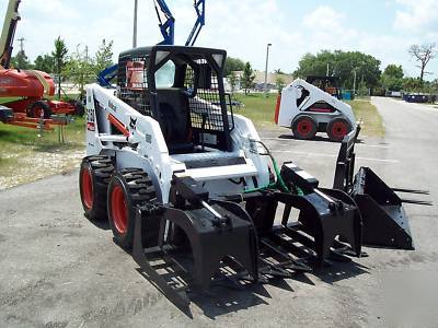 New bobcat S150 loader, 2005,w/ brand grapple & forks