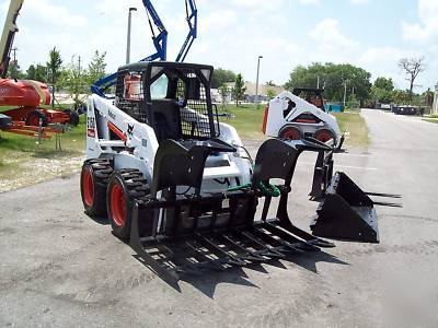 New bobcat S150 loader, 2005,w/ brand grapple & forks