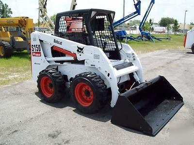 New bobcat S150 loader, 2005,w/ brand grapple & forks