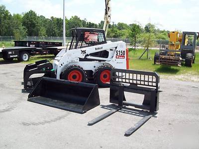 New bobcat S150 loader, 2005,w/ brand grapple & forks