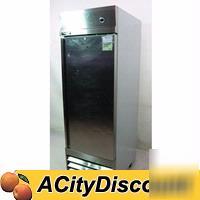 Used s/s delfield reachin solid door cooler w/ 4 racks