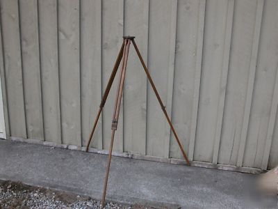 Antique wooden surveyors tripod construction photo
