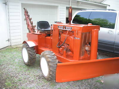 Ditch witch trencher, 5-ft bar, back fill blade