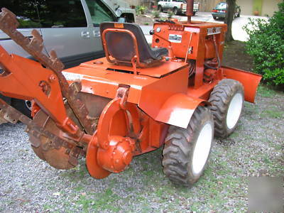 Ditch witch trencher, 5-ft bar, back fill blade