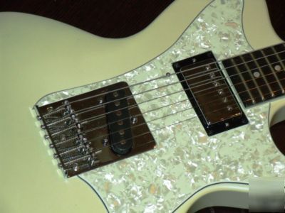 Patent for sale: adjustable neck-angle joint for guitar