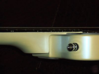 Patent for sale: adjustable neck-angle joint for guitar