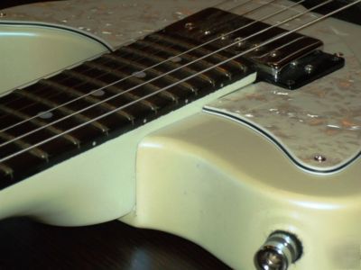 Patent for sale: adjustable neck-angle joint for guitar