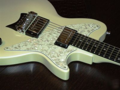 Patent for sale: adjustable neck-angle joint for guitar