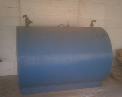 Service station fuel pump and above ground tank 