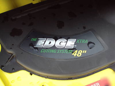 Slightly used sharp X500 john deere lawn mower