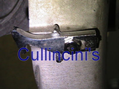 Door latch for pelican head hobart type attachments