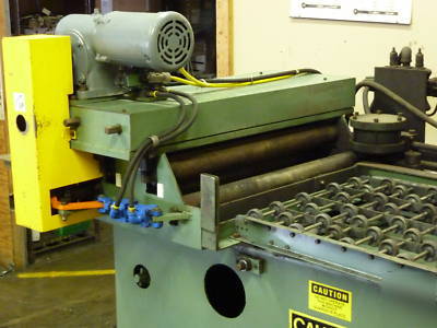 Used sheet metal straightener 