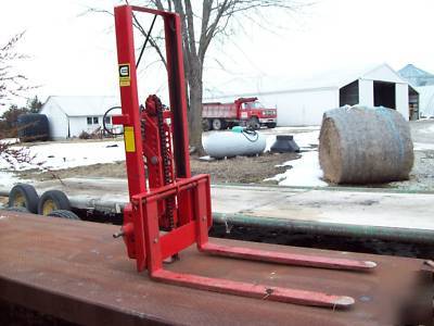 Tractor 3-point fork lift with hydraulic tilt. 2000 lbs