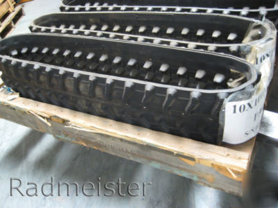 A set of 2 rubber tracks for camisa, fercad, sato