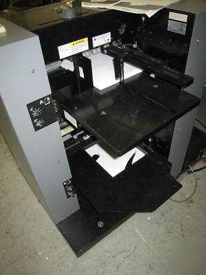 Bookletmaker / trimmer, setfeeder, sadlestitched books