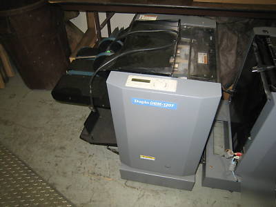 Bookletmaker / trimmer, setfeeder, sadlestitched books