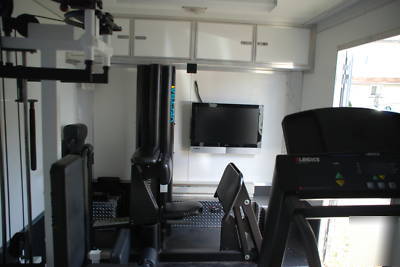 8' x 18' trailer and excercise equipment
