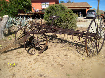 Antique horse drawn hay rake