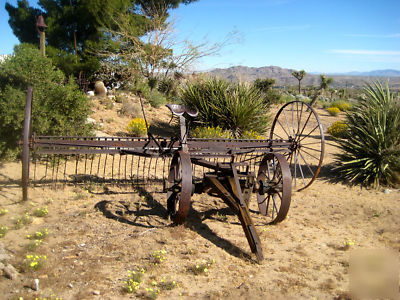 Antique horse drawn hay rake