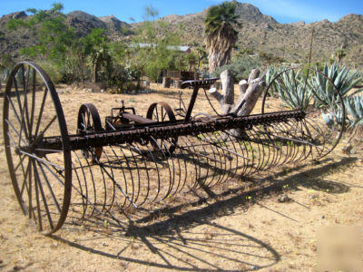 Antique horse drawn hay rake