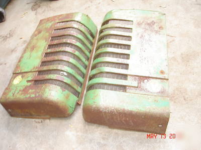 Pair of styled john deere a grills 