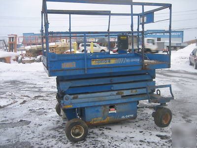 Urpight X24DW scissor lift 24' deck hgt.,30' work hgt. 