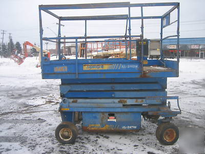 Urpight X24DW scissor lift 24' deck hgt.,30' work hgt. 