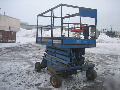 Urpight X24DW scissor lift 24' deck hgt.,30' work hgt. 