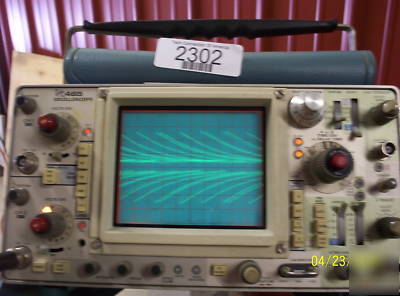 Tektronix 465 oscilloscope w/ document pouch and handle